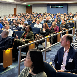 Candid work event photo of attendees