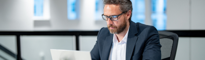 middle-age man using laptop